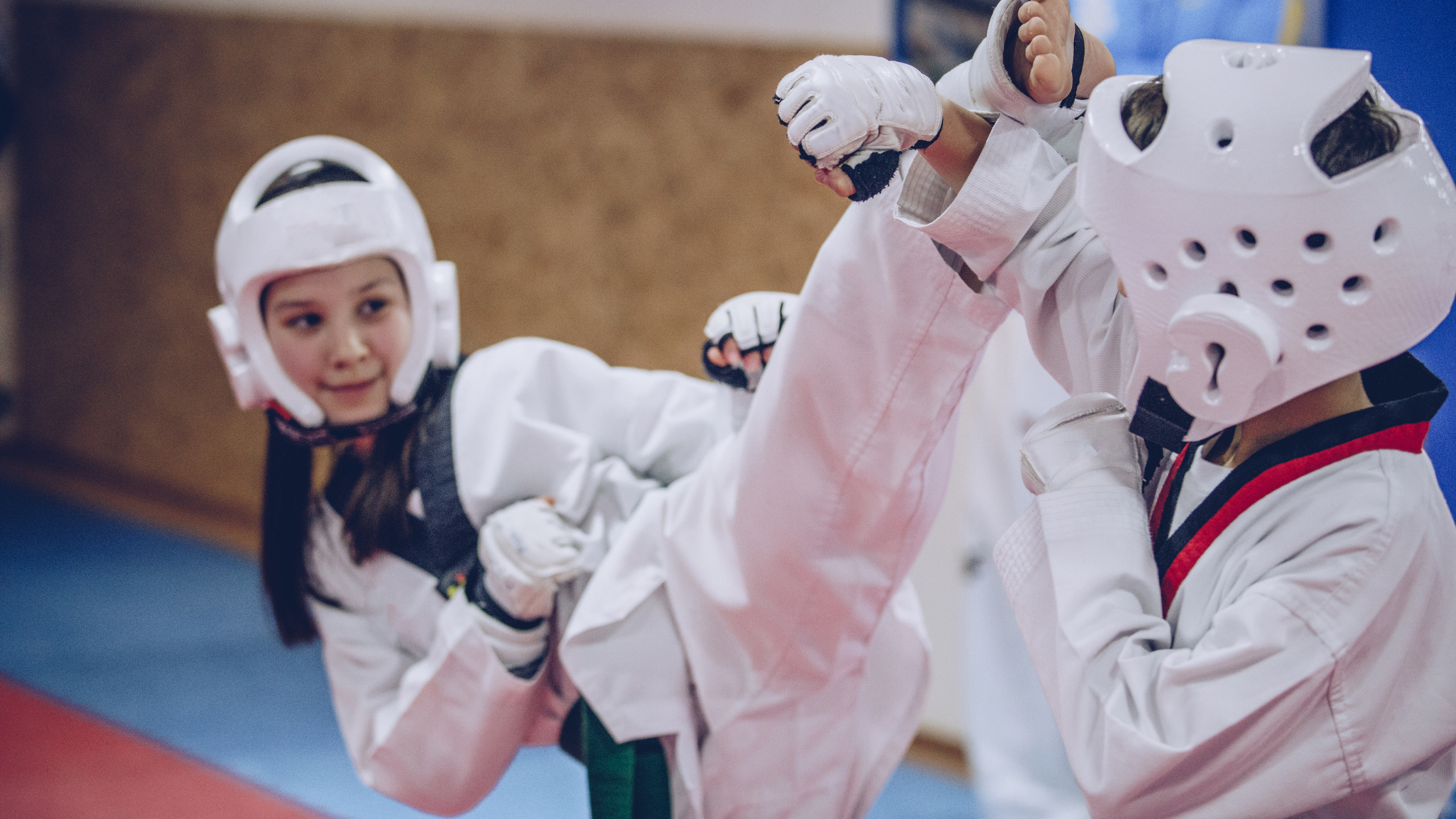 Children sparring in martial arts class